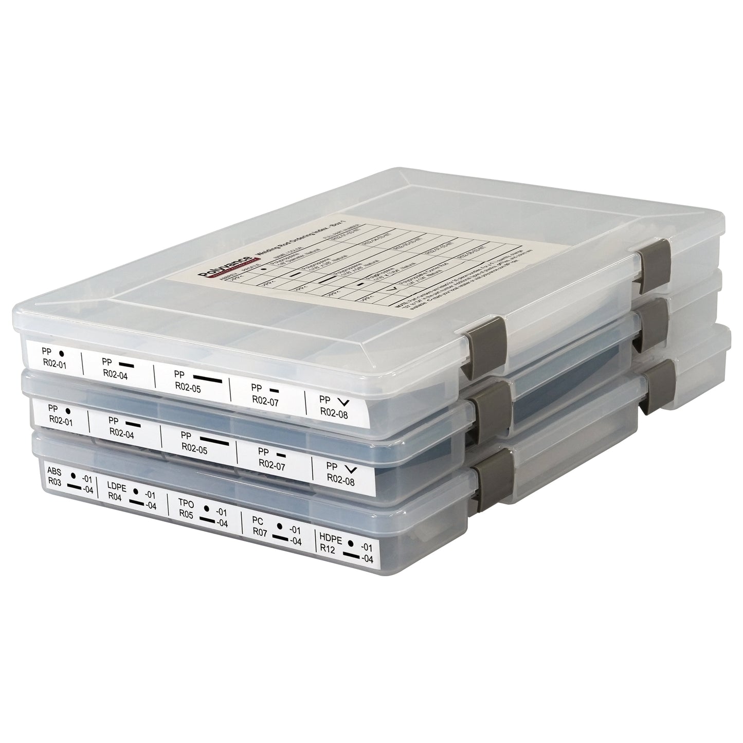 Three stacked plastic boxes filled with plastic welding rods. Each box has a label on the top and the end identifying the welding rods contained within.