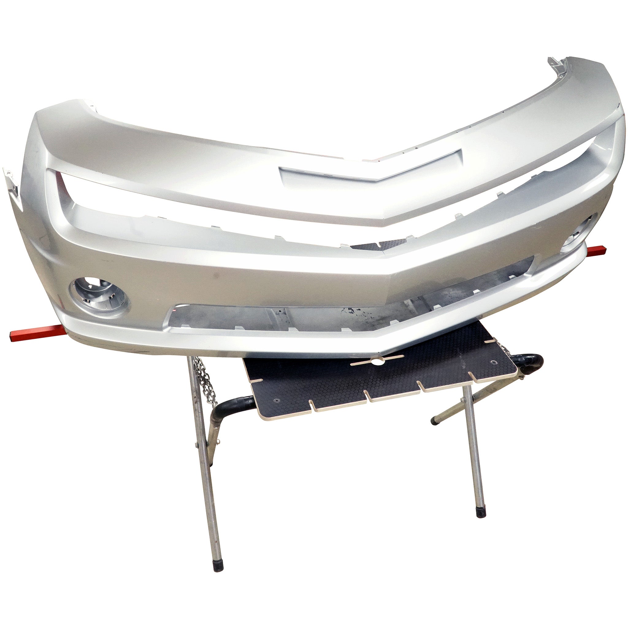 Plastic Repair Workstation with a large bumper cover on top. Sitting on a scissor stand.