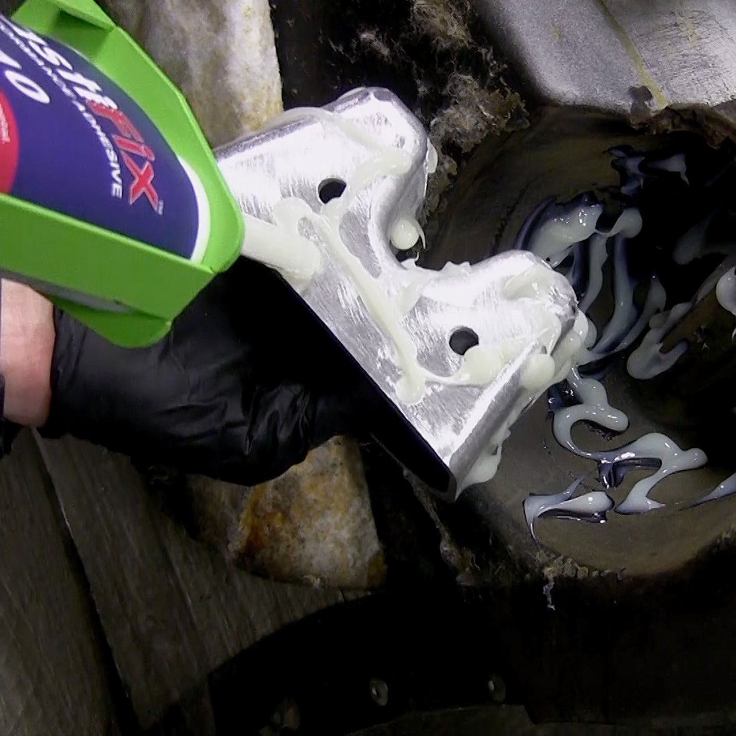 Applying PlastiFix to the aluminum plug