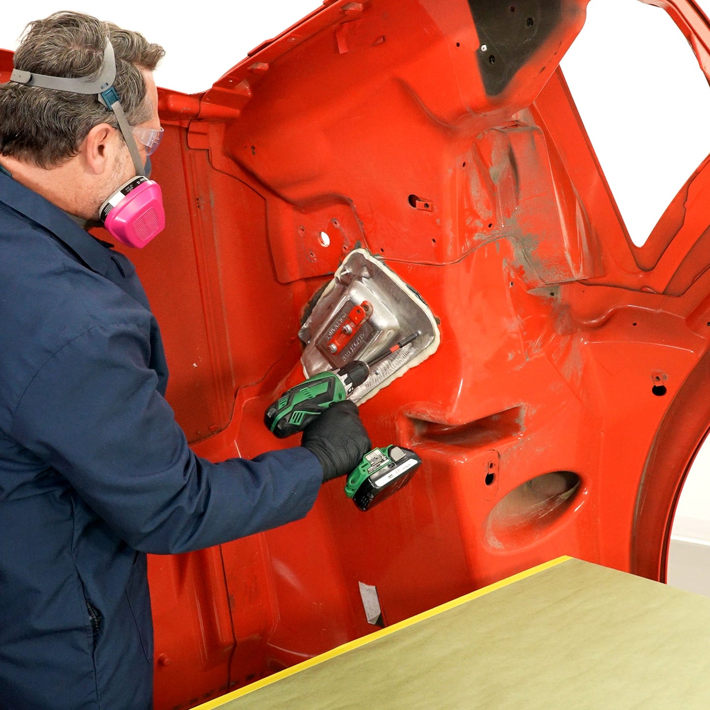 Installing the casting to the hood with screws