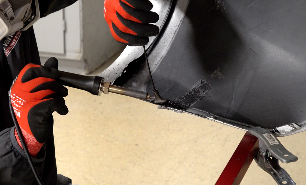 Repairing a Tear to the Edge with an Airless Plastic Welder
