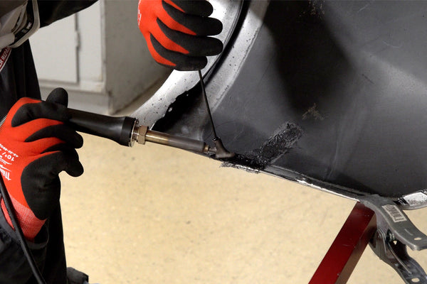 Repairing a Tear to the Edge with an Airless Plastic Welder