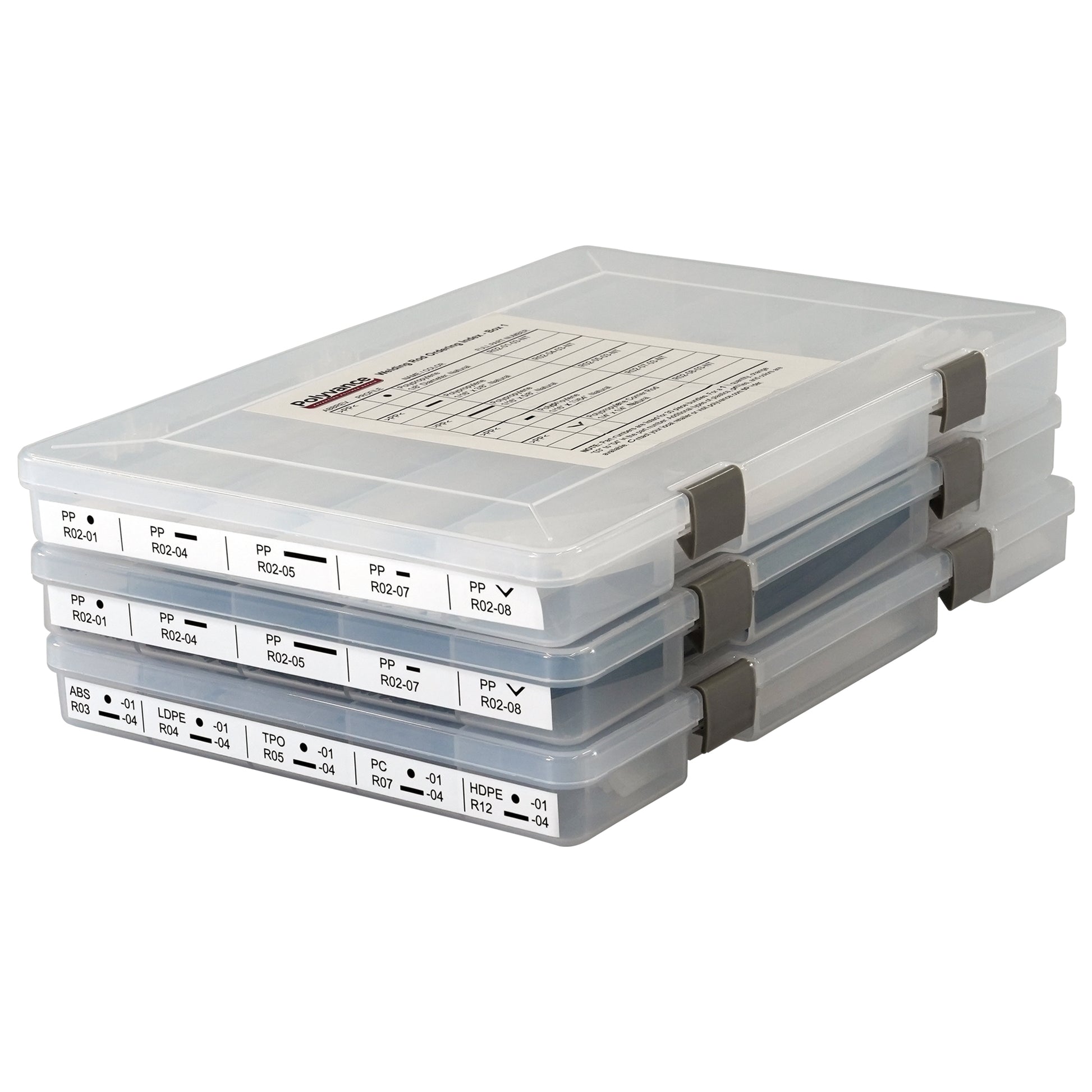 Three stacked plastic boxes filled with plastic welding rods. Each box has a label on the top and the end identifying the welding rods contained within.