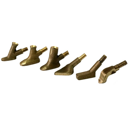 Six airless plastic welder tips lined up diagonally