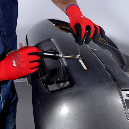 A polyurethane bumper cover is being repaired with the airless plastic welder and polyurethane welding rod