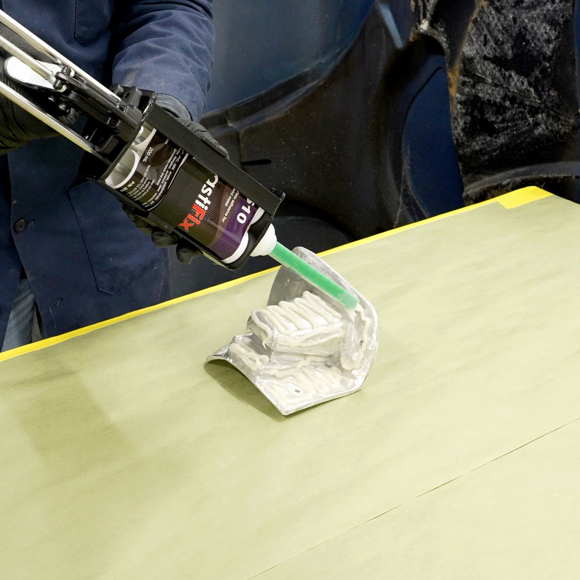 Applying PlastiFix to the aluminum casting