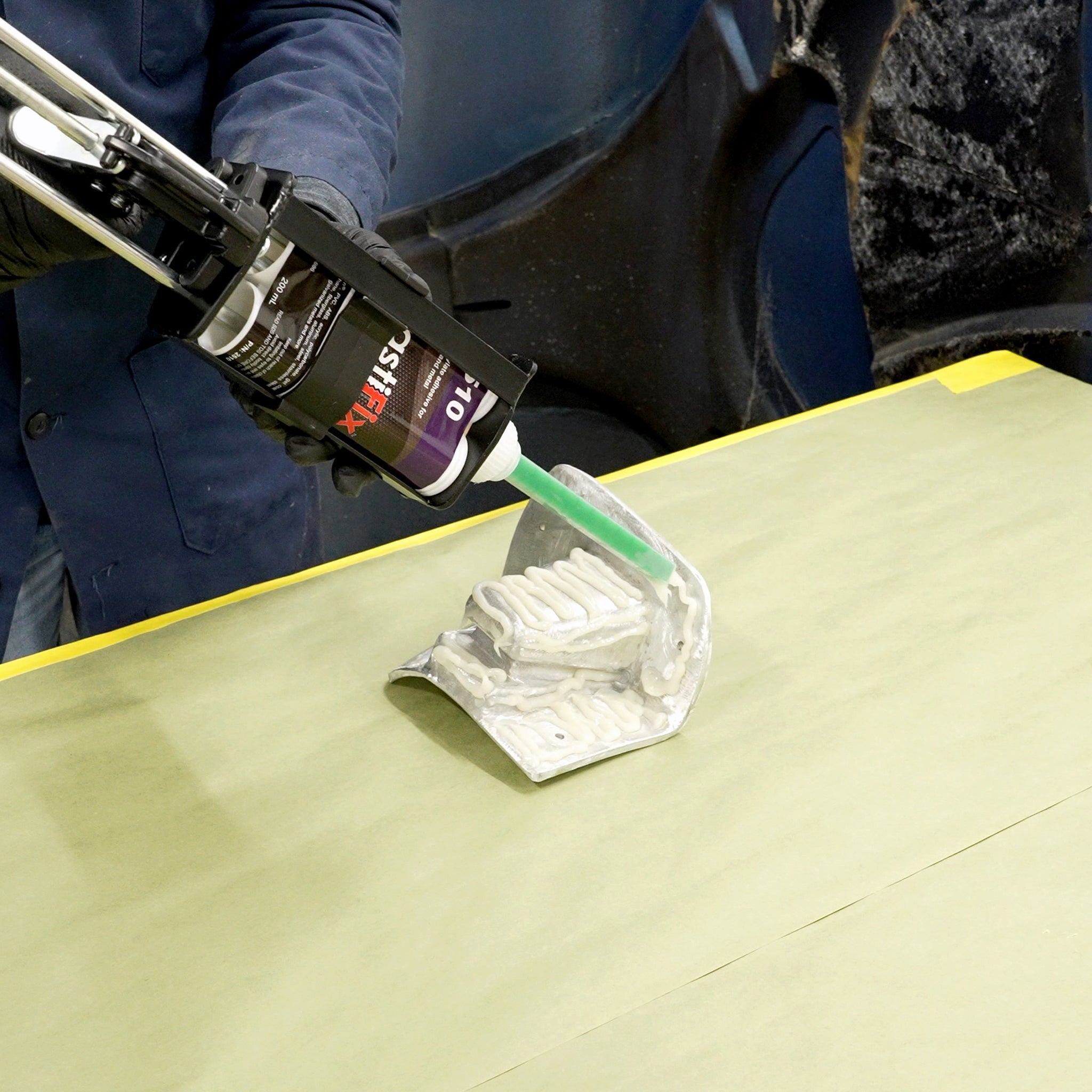 Applying PlastiFix to the aluminum casting