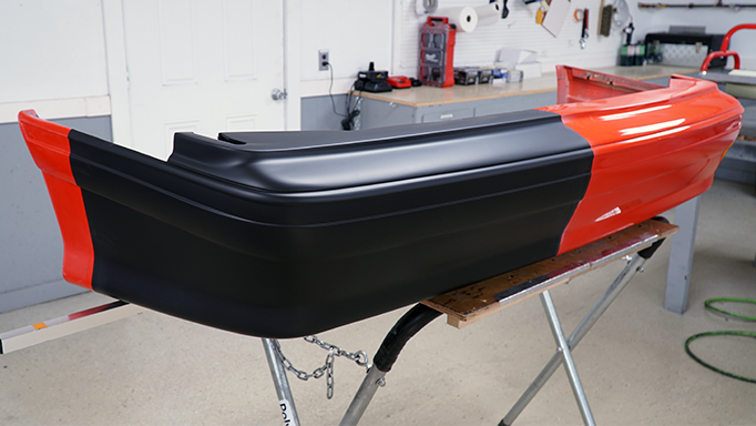 The 1993 Ford Mustang Cobra rear bumper after being primed.