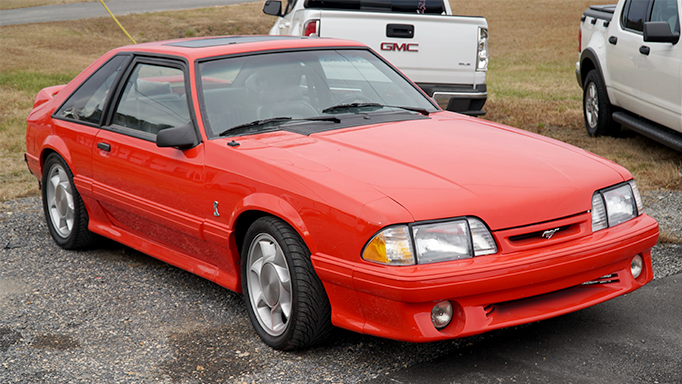 A photo shopwing the front and side of the 1993 Ford Mustang Cobra.