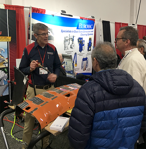 Kurt explains nitrogen plastic welding to two gentlemen