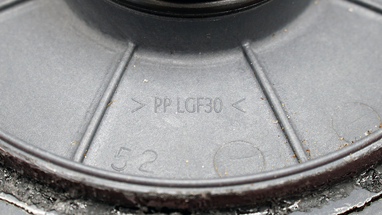 The plastic identification symbol on the pool pump housing. It reads PP LGF30