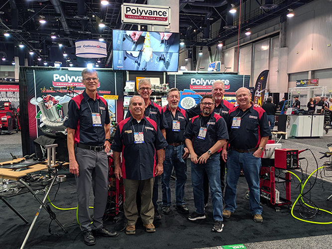 The Polyvance crew in front of the booth.