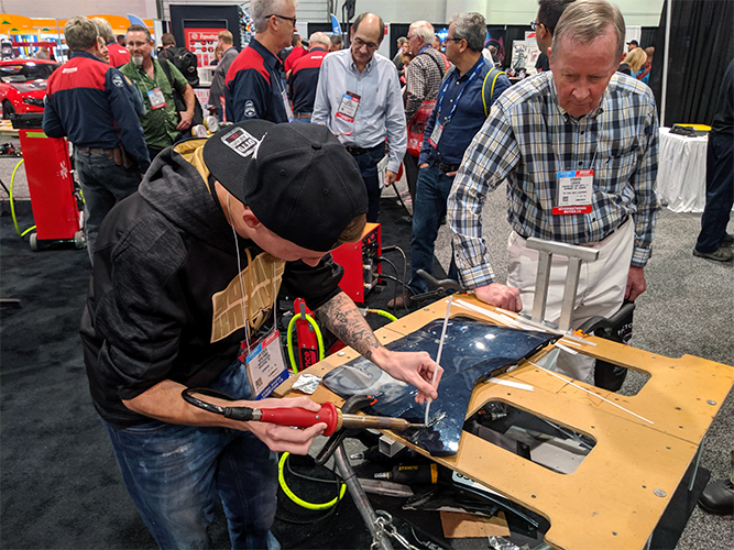 Jayden Wolford using the nitrogen plastic welder