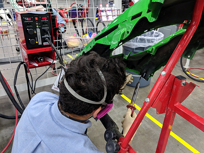 Contestant using nitrogen plastic welder