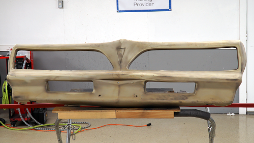 The 1978 Trans Am front bumper after all of the paint has been sanded off.